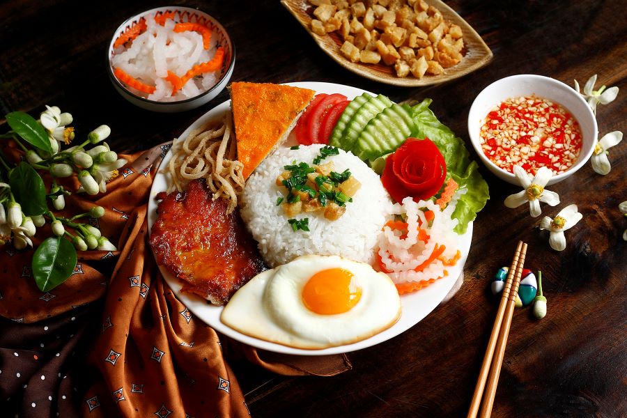 Com Tam, beloved in Vietnamese rice dishes, blends flavor, texture, and tradition
